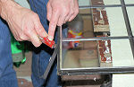 Splitting misted sealed double glazing