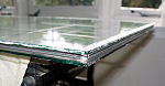 Re-assembled sealed double glazing unit