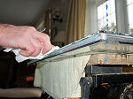 Cleaning a re-sealed double glazing unit